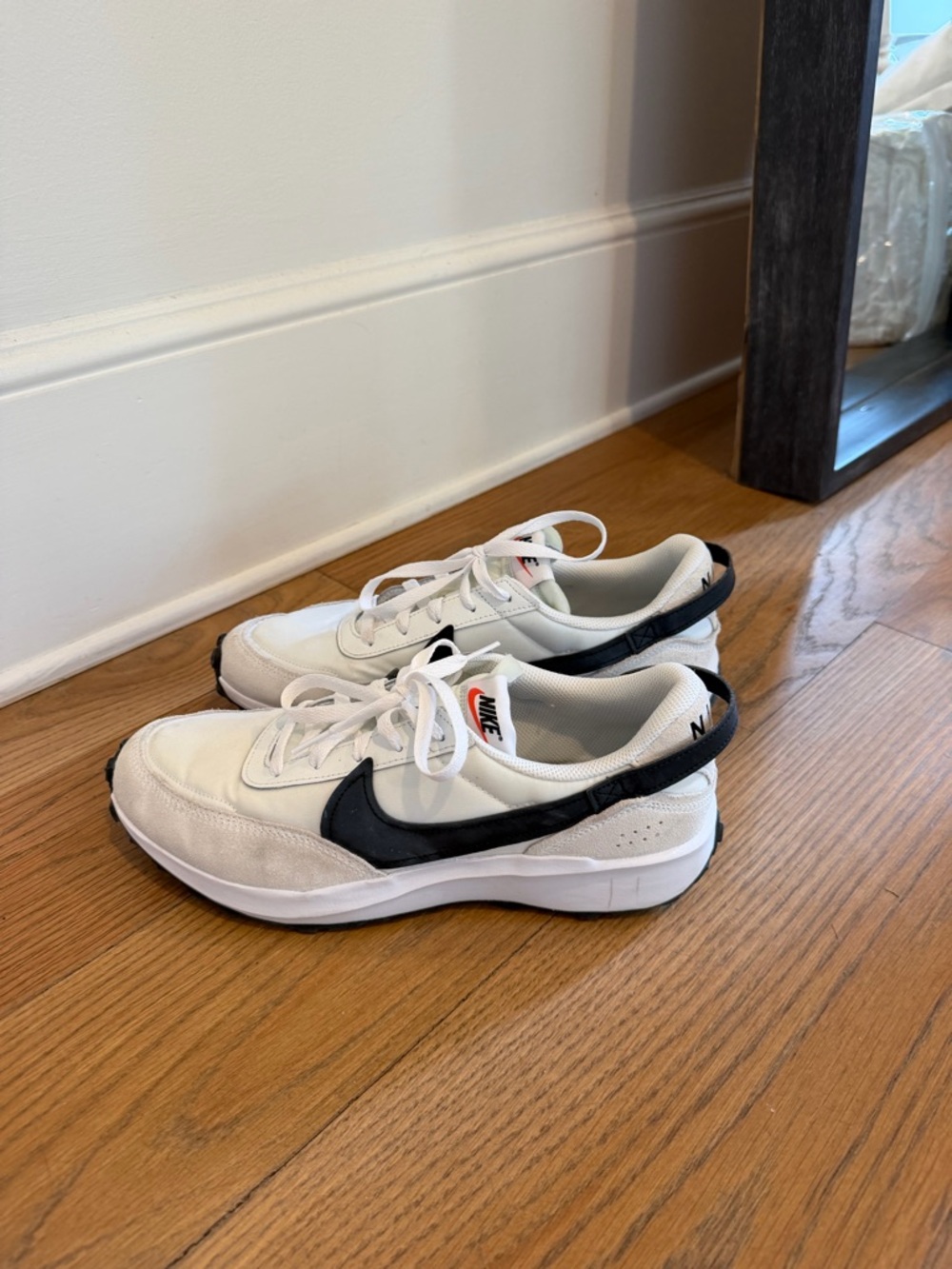 Nike White Waffle Sneakers with Black Swoosh Accent